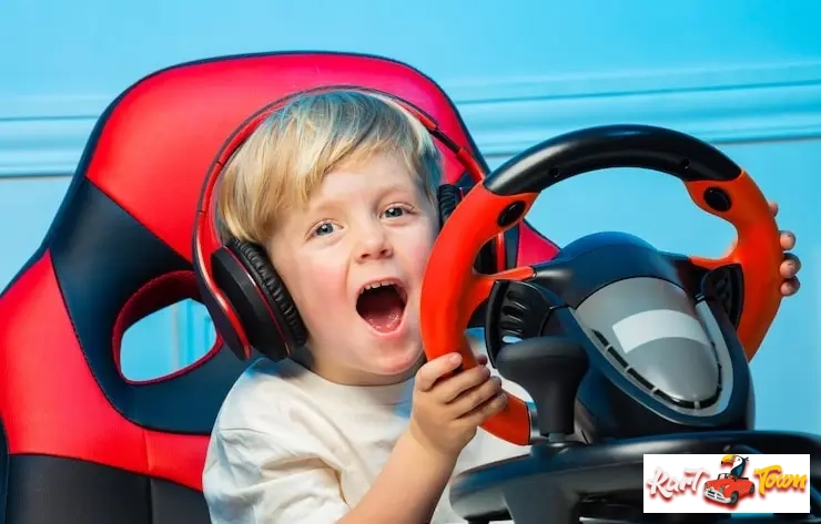 Young boy with headphones enthusiastically gripping a racing wheel controller.
