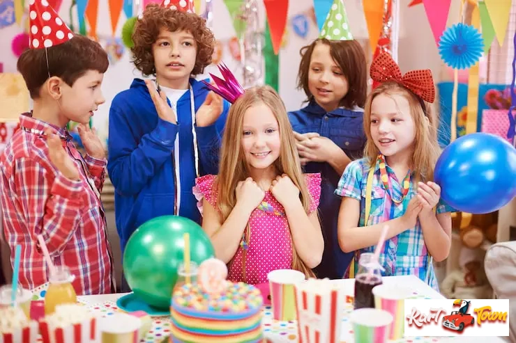 A 7-year-old boy or girl successfully climbing a rope.