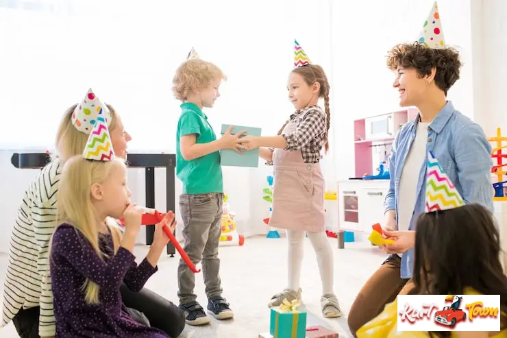 Kids exchanging gifts during a fun birthday celebration