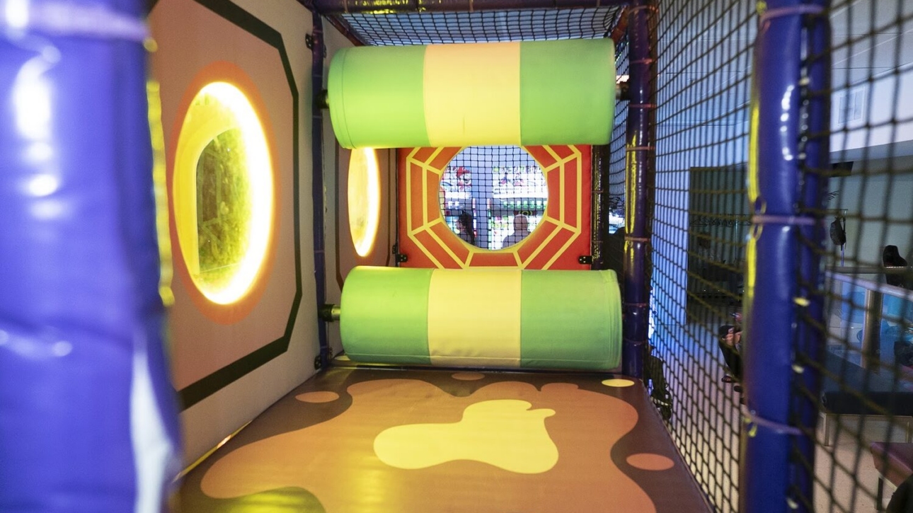 Brightly lit padded play zone for younger kids