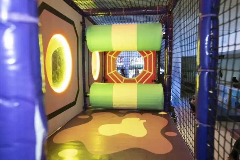 Brightly lit padded play zone for younger kids