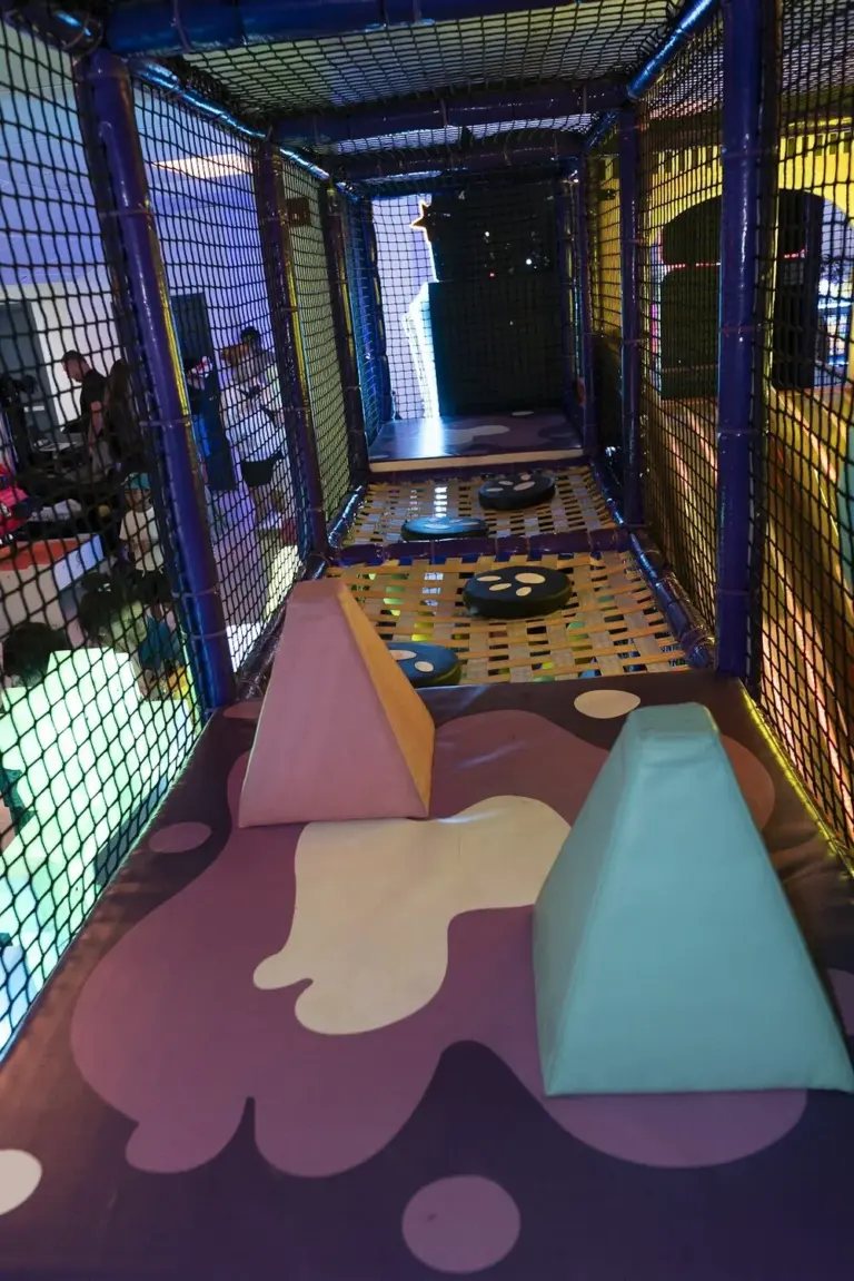 Colorful padded tunnels in the soft play zone