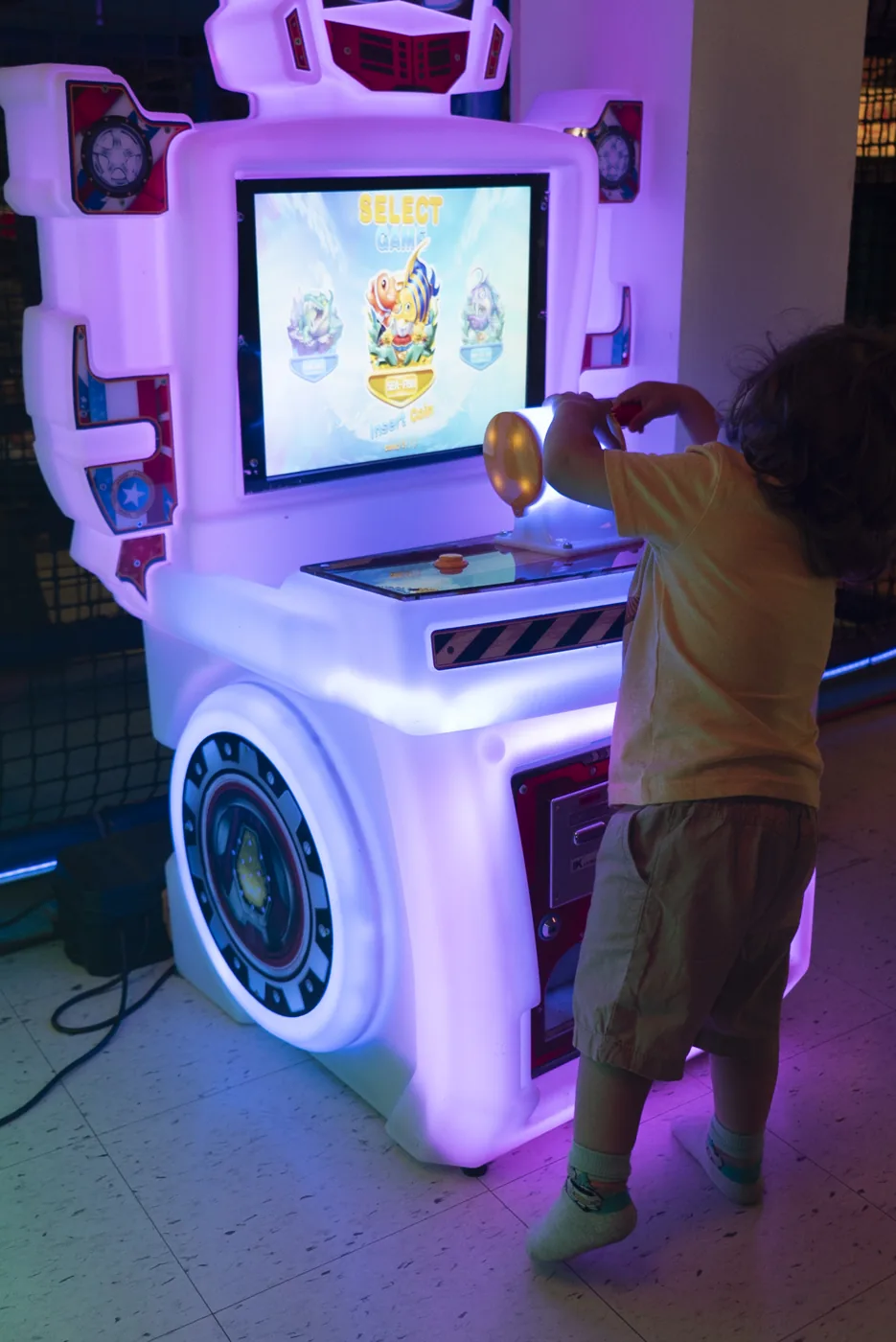 Children enjoying arcade games at Kart Town