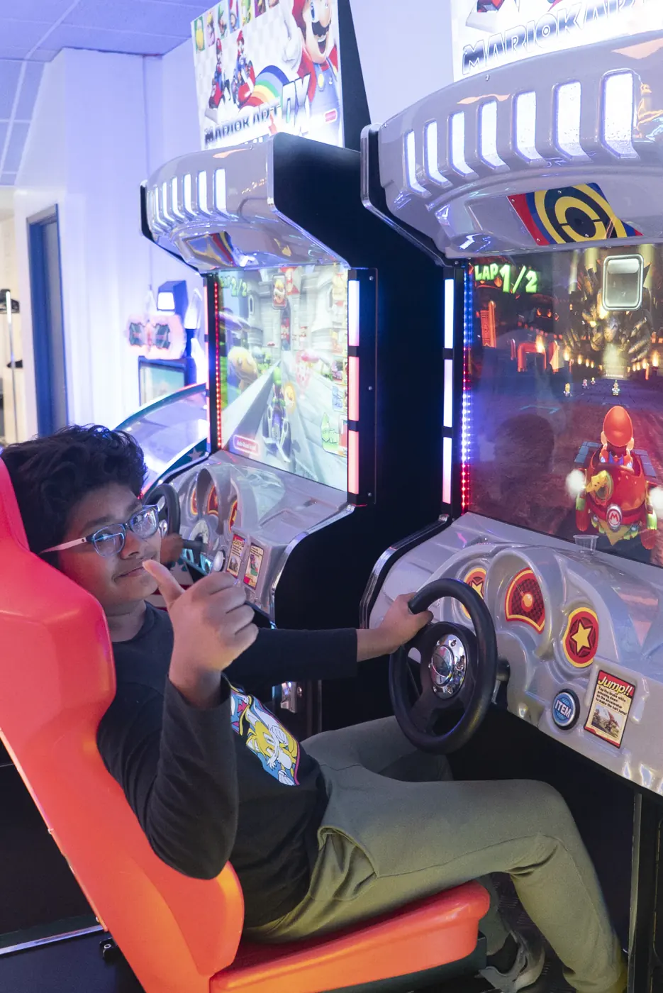 Children enjoying arcade games at Kart Town