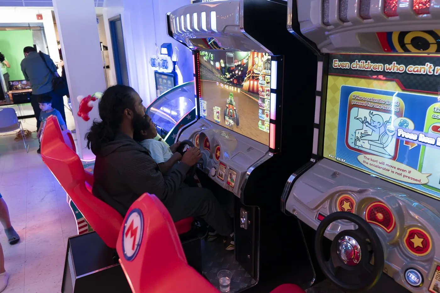 Children enjoying arcade games at Kart Town