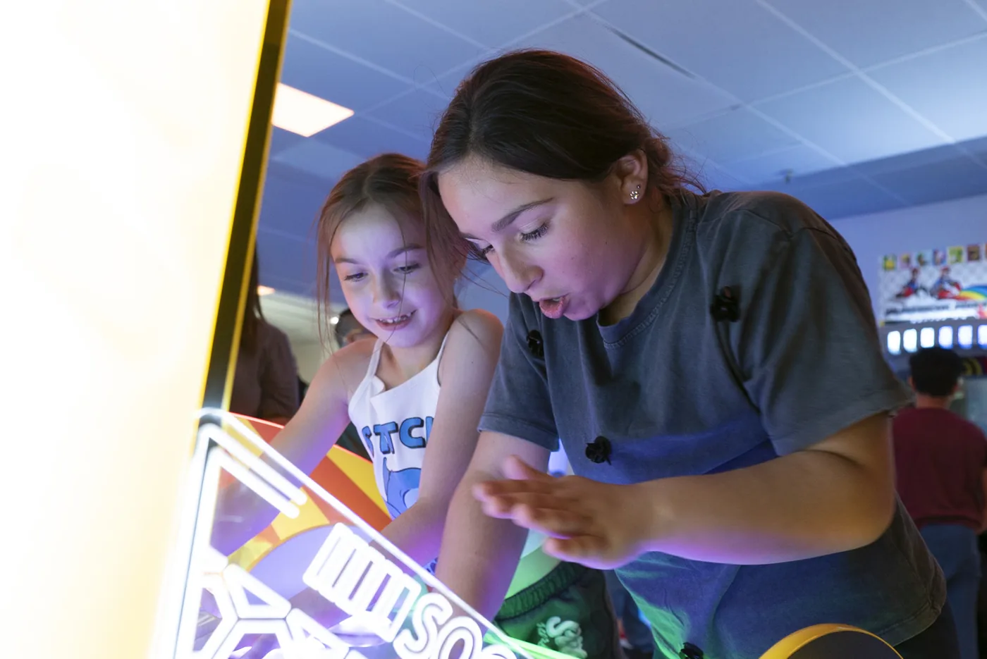 Children enjoying arcade games at Kart Town