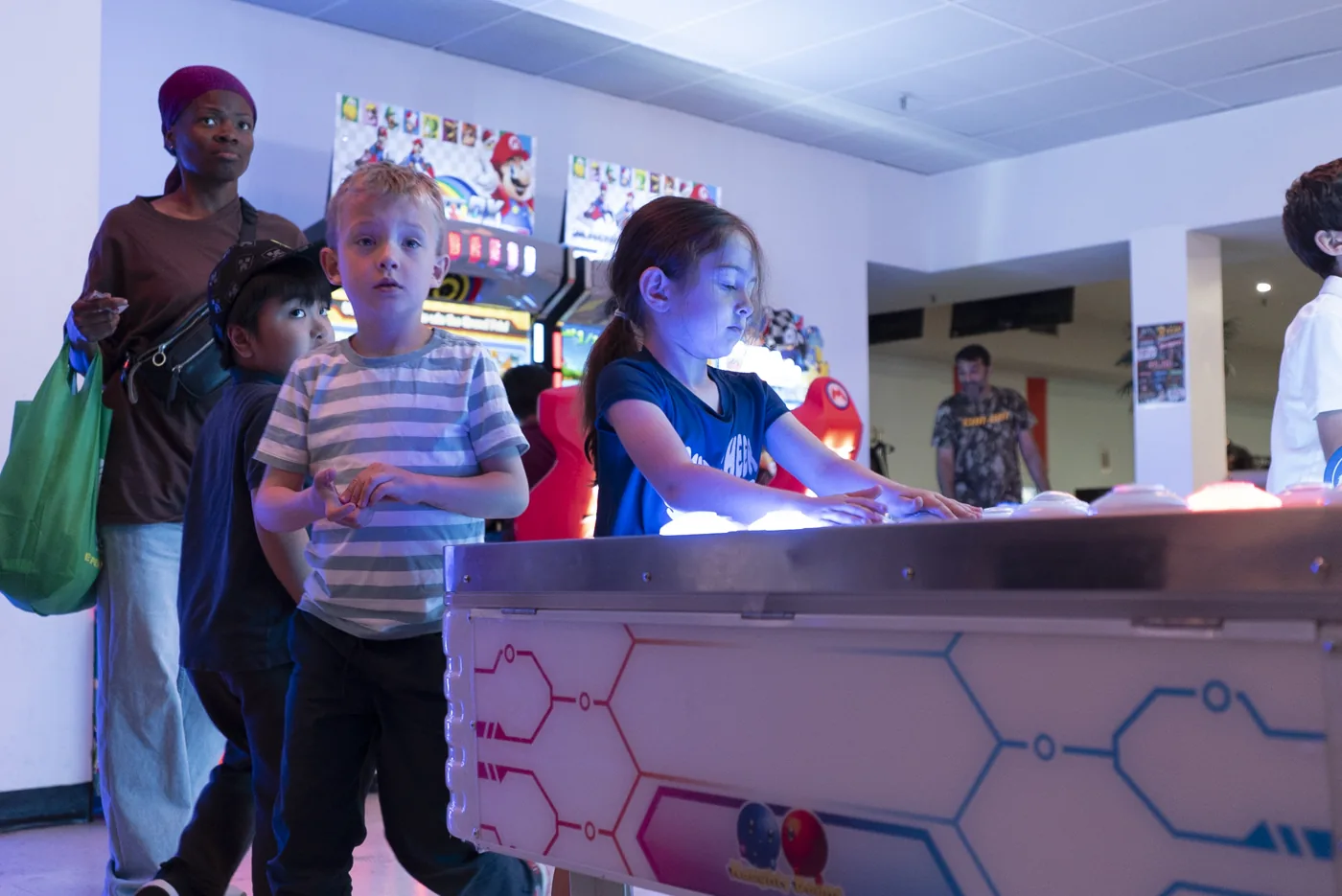 Children enjoying arcade games at Kart Town