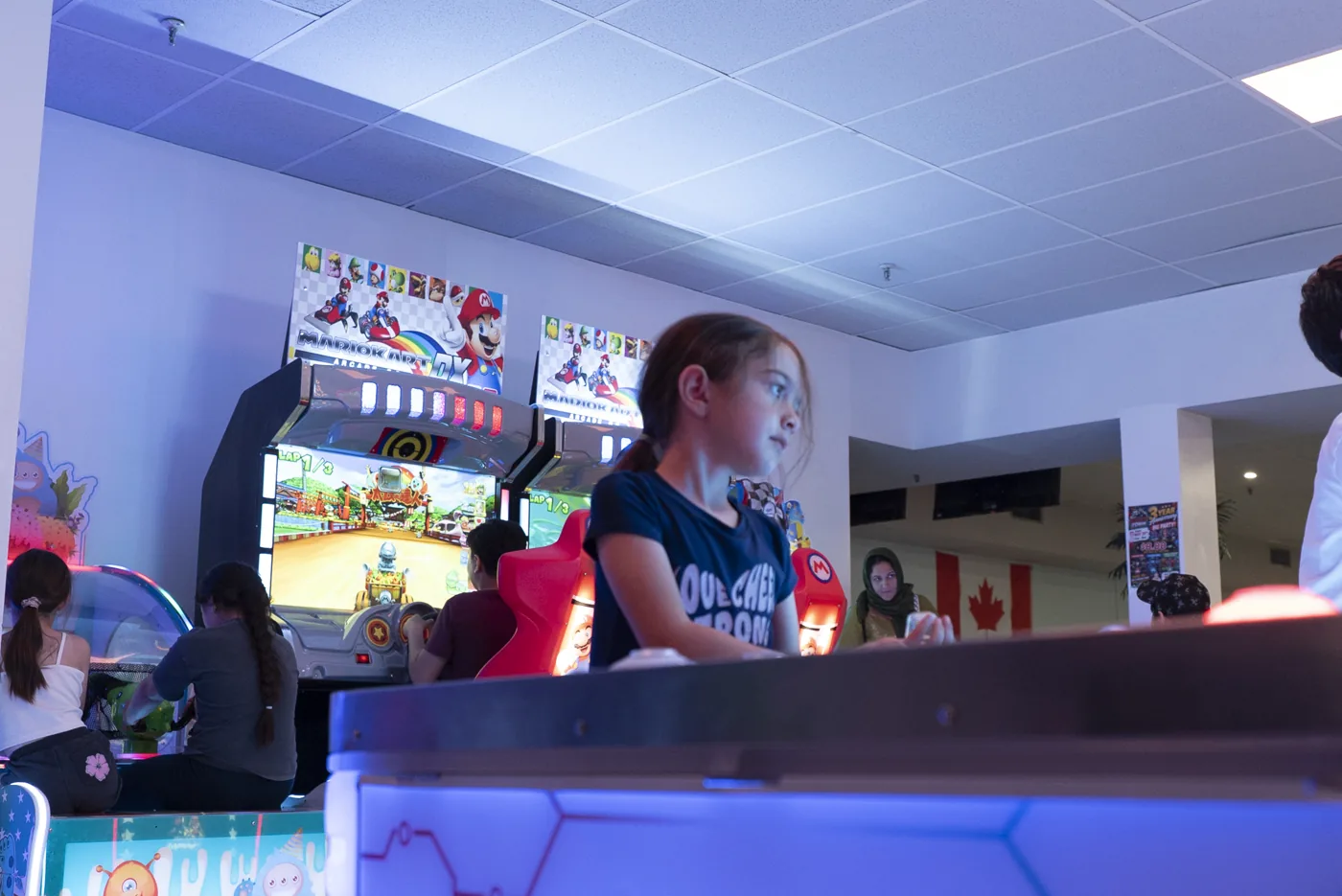 Children enjoying arcade games at Kart Town