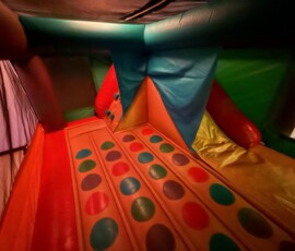 A colourful inflatable world of bouncing fun for every birthday. Colorful inflatable bouncy castle interior
