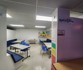 Step into the Monkey Room — one of several private themed rooms to host your group. Purple Monkey Room entrance with welcome sign at Kart Town Aurora